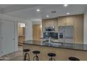 Modern kitchen with granite countertops and stainless steel appliances at 7121 E Rancho Vista Dr # 4004, Scottsdale, AZ 85251