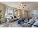 Bright and airy living room with comfortable seating at 3402 W Acoma Dr, Phoenix, AZ 85053