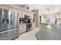 Modern kitchen featuring stainless steel appliances at 15309 W Blue Verde Dr, Sun City West, AZ 85375