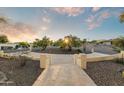 Landscaped front yard with circular driveway at 16030 E Cholla Dr, Fountain Hills, AZ 85268