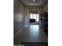 Tiled entryway with views of living room at 30893 W Pinchot W Ct, Buckeye, AZ 85396