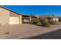House exterior, front view with attached garage and carport at 2029 S Las Palmas --, Mesa, AZ 85202
