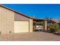 House exterior, front view with attached garage and carport at 2029 S Las Palmas --, Mesa, AZ 85202