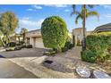 Luxury home with attractive landscaping and a two-car garage at 4645 N 65Th St, Scottsdale, AZ 85251