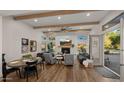 Bright and airy living room with fireplace and access to backyard at 6429 S Honor Ct, Gilbert, AZ 85298