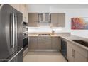 Modern kitchen with stainless steel appliances and neutral tones at 7180 E Kierland Blvd # 314, Scottsdale, AZ 85254