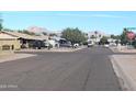 Quiet residential street with mountain views and nearby homes at 2044 W 9Th Ave, Apache Junction, AZ 85120