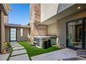 Private backyard oasis with hot tub and desert landscaping at 37200 N Cave Creek Rd # 1126, Scottsdale, AZ 85262