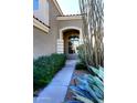 Landscaped walkway leading to the front entrance of the home at 4321 E Desert Sky Ct, Cave Creek, AZ 85331
