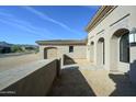 Exterior view of a luxury home showcasing architectural details and landscaping at 13272 E La Junta Rd, Scottsdale, AZ 85255