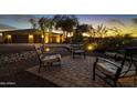 Relaxing patio with seating area, perfect for outdoor enjoyment at 15833 W Cinnabar Ct, Waddell, AZ 85355