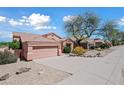 One-story home with desert landscaping and a two-car garage at 16914 E Britt Ct, Fountain Hills, AZ 85268