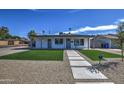 Updated home with artificial turf and walkway at 3135 N 34Th St, Phoenix, AZ 85018
