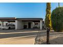 Single-story home with carport and desert landscaping at 3017 W Hearn Rd, Phoenix, AZ 85053