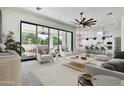Bright living room with access to a spacious patio at 2041 N Orchard --, Mesa, AZ 85213