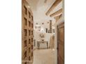 Elegant entryway with wood door and stone floors at 9215 E Red Lawrence Dr, Scottsdale, AZ 85262