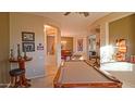 Game room featuring a pool table and access to entry at 42715 N Courage Trl, Anthem, AZ 85086