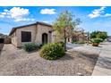 Single-story home with landscaping and a paved driveway at 1095 W Desert Valley Dr, San Tan Valley, AZ 85143