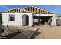 New home under construction, showing the framing and exterior walls at 37600 N Cowboy Ln, San Tan Valley, AZ 85140