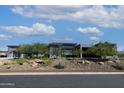 Modern home with gray stucco exterior and two car garage at 30505 N Sage Dr, Peoria, AZ 85383