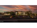 Contemporary home with large windows and desert landscaping at 30505 N Sage Dr, Peoria, AZ 85383