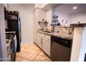Modern kitchen with granite countertops and stainless steel appliances at 2025 E Campbell Ave # 330, Phoenix, AZ 85016