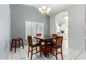 Casual dining area with square table and four chairs at 8333 W Wescott Dr, Peoria, AZ 85382