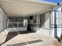 Covered patio with white railings and seating area at 225 S Motherlode Dr, Apache Junction, AZ 85119