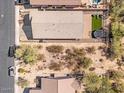 Aerial view showcasing the home's layout, backyard, and surrounding landscape at 4657 E Matt Dillon Trl, Cave Creek, AZ 85331