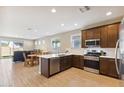 Modern kitchen with stainless steel appliances at 24884 N 171St Ln, Surprise, AZ 85387