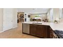 Island kitchen with stainless steel appliances at 24884 N 171St Ln, Surprise, AZ 85387
