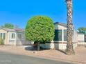 Single-wide manufactured home with carport at 8865 E Baseline Rd # 504, Mesa, AZ 85209