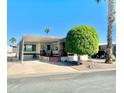 Single-wide manufactured home with carport at 8865 E Baseline Rd # 504, Mesa, AZ 85209