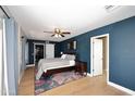 Spacious primary bedroom with wood floors and ensuite bathroom at 3413 N 16Th N Dr, Phoenix, AZ 85015
