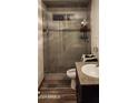 Updated bathroom with glass shower and granite vanity at 2616 N 50Th Ave, Phoenix, AZ 85035