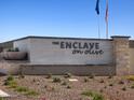 Community entrance sign for The Enclave on Olive at 17318 W Sanna St, Waddell, AZ 85355