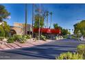 Community entrance with gated access and landscaping at 7920 E Camelback Rd # 509, Scottsdale, AZ 85251