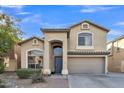 Two-story house with attached garage and landscaping at 8708 S 50Th Ln, Laveen, AZ 85339