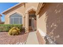 Front entryway with a decorative iron gate and well-manicured landscaping at 4356 E Rancho Tierra Dr, Cave Creek, AZ 85331