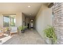 Light and airy entryway with tile flooring and seating area at 17543 E Silver Sage Ln, Rio Verde, AZ 85263