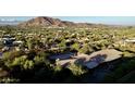 Aerial view of the property and surrounding mountain landscape at 5123 E Mcdonald Dr, Paradise Valley, AZ 85253