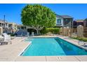 Inviting community pool with lounge chairs and a shaded seating area at 17365 N Cave Creek Rd # 246, Phoenix, AZ 85032