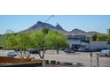 View of the community with mountains and local businesses in the distance at 17365 N Cave Creek Rd # 246, Phoenix, AZ 85032