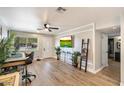 Bright and airy living room with wood-look floors at 1413 E Windsor Ave, Phoenix, AZ 85006