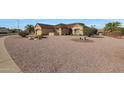 Single-story home with desert landscaping and two-car garage at 20407 N Tanglewood Dr, Sun City West, AZ 85375