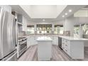 Modern kitchen with white cabinets, quartz countertops, and stainless steel appliances at 10338 E San Salvador Dr, Scottsdale, AZ 85258