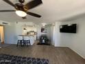 Open concept living room, kitchen and dining area at 14416 N Teakwood Ln # D, Fountain Hills, AZ 85268