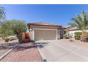 One-story home with attached garage and desert landscaping at 2194 N Hudson Ct, Florence, AZ 85132