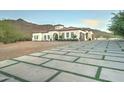 Beautiful home with a large driveway and mountain backdrop at 3923 W Fox Rd, Laveen, AZ 85339