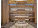 Complex courtyard with a water fountain and manicured landscaping at 5132 N 31St N Way # 134, Phoenix, AZ 85016